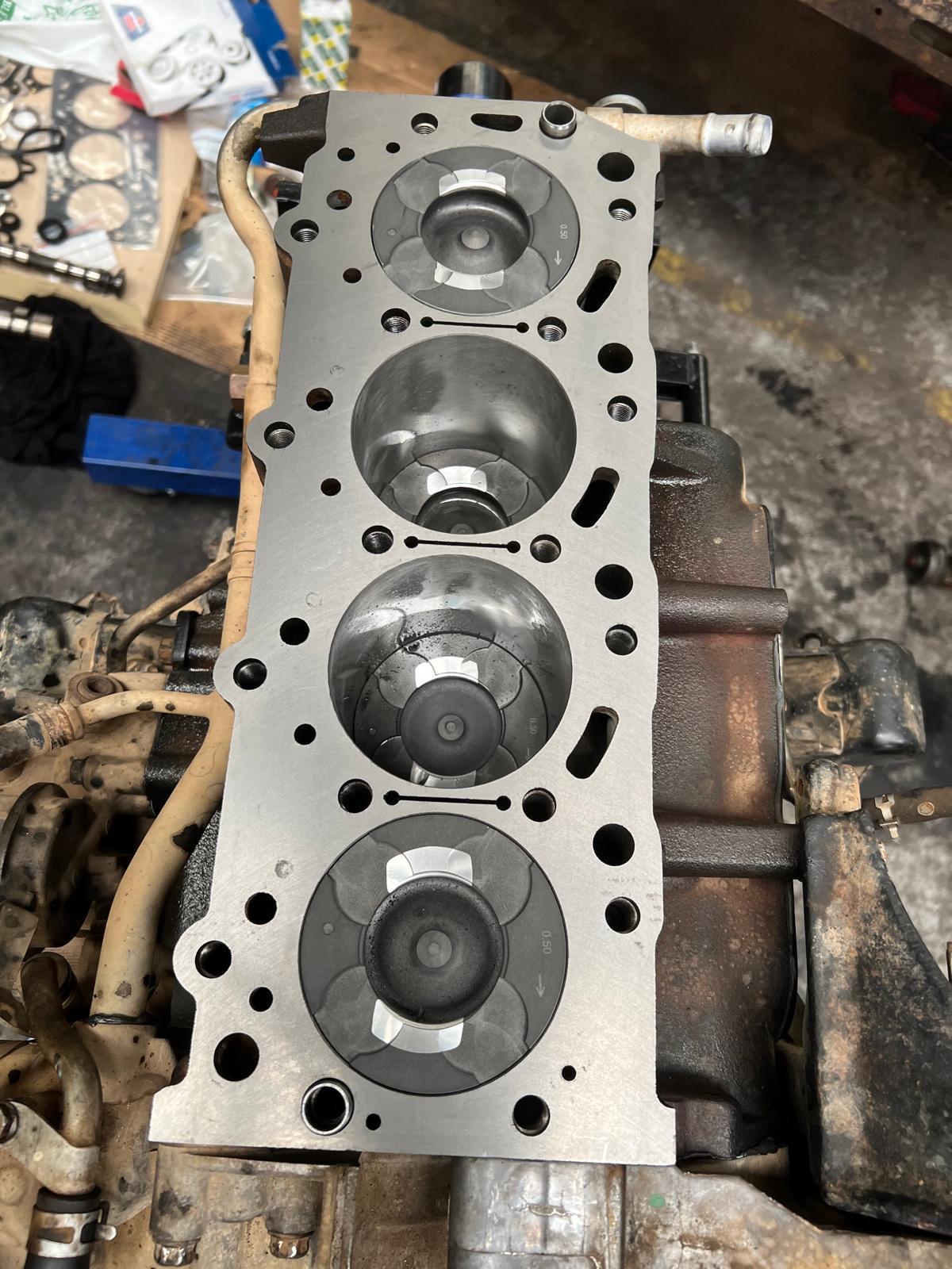Engine block with pistons ready for the cylinder head